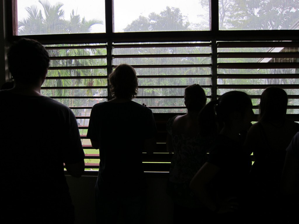 youth volunteers staring at the random deluge